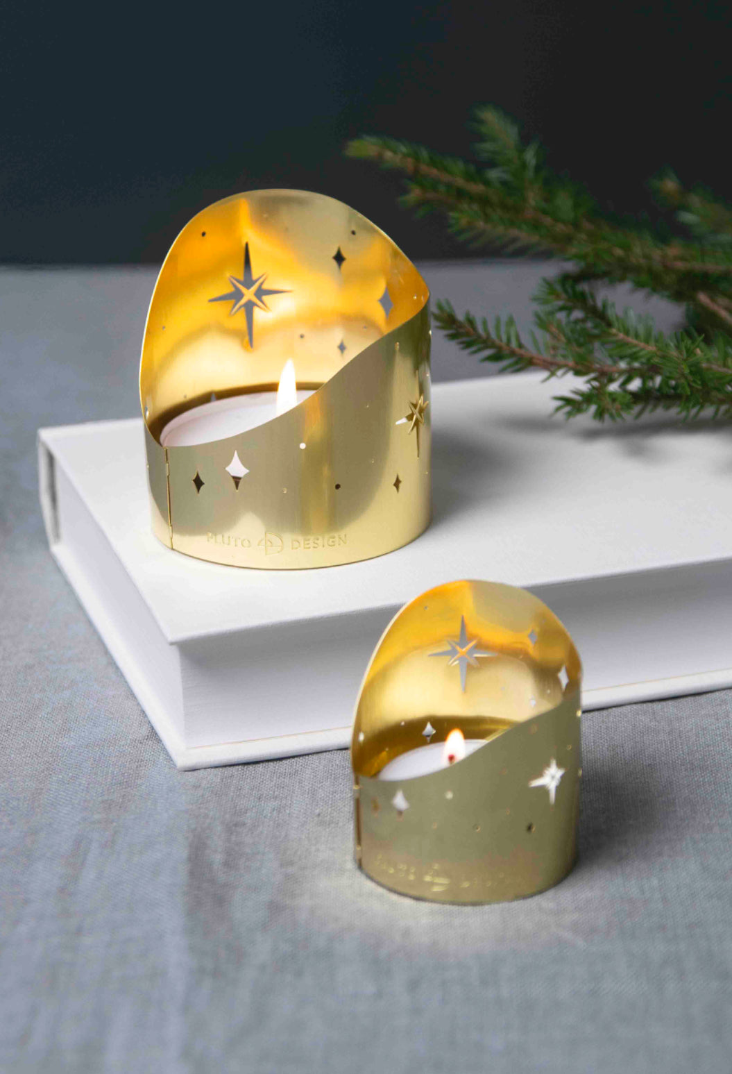 Både stor och liten ljuslykta Northern Star. Guld.