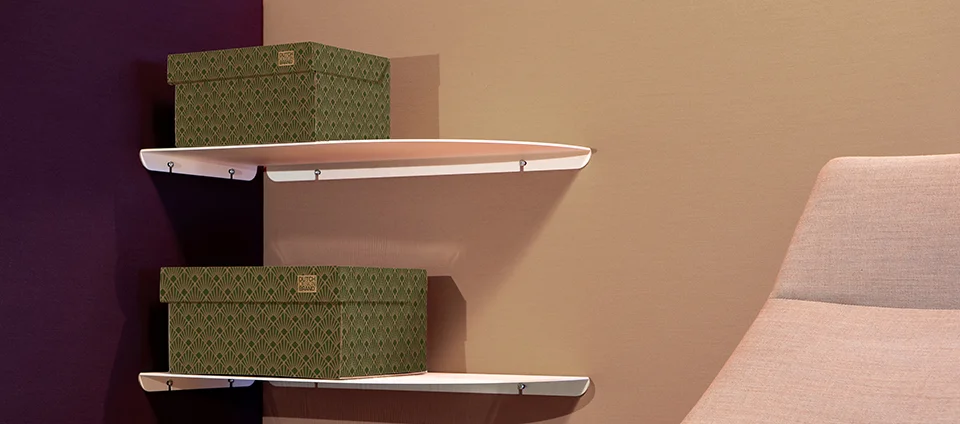 Förvaringslåda i kartong med grönt art deco mönster.
