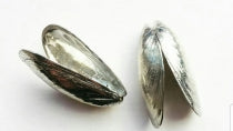 Musselbestick i tenn. Set med två. 